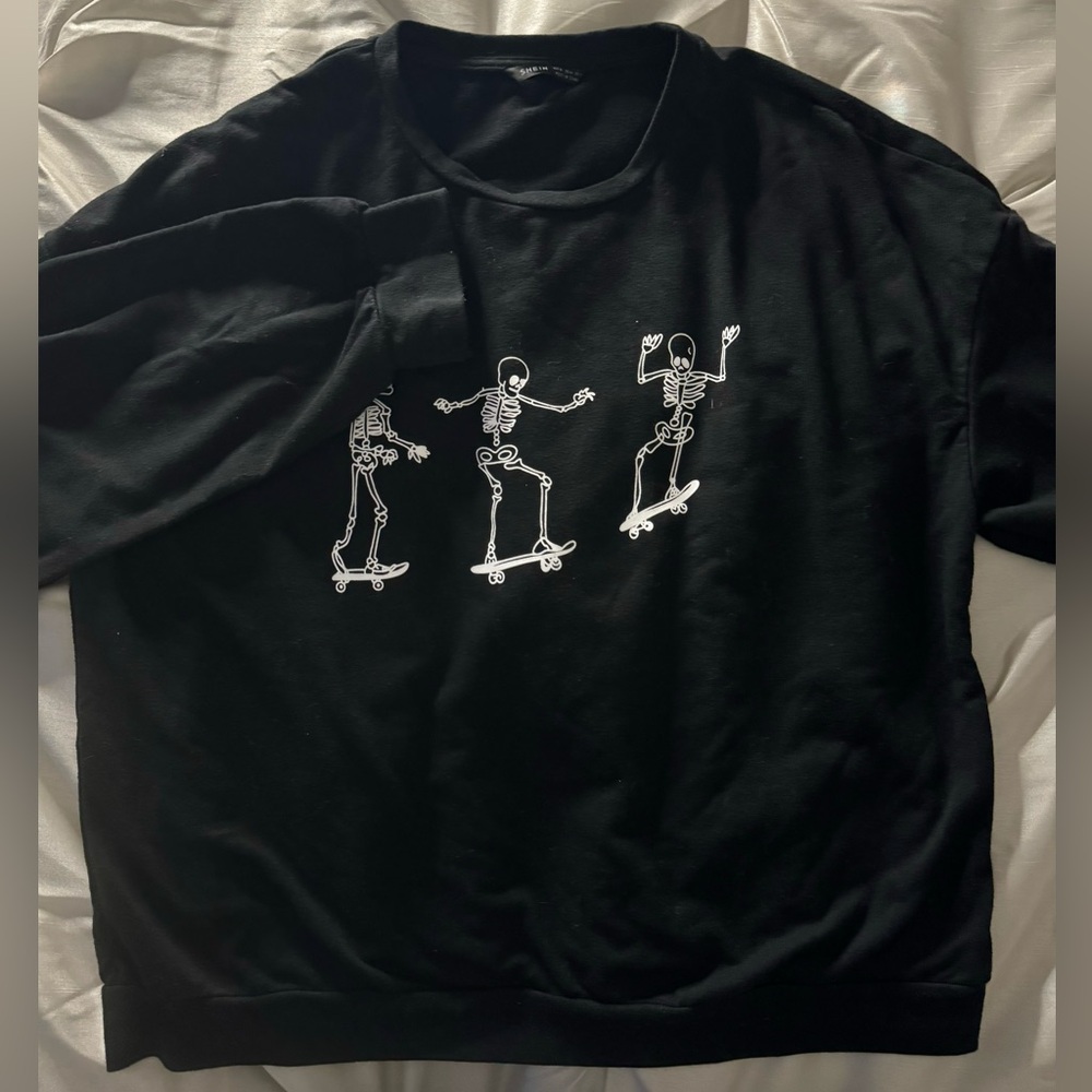 Black sweatshirt with skeleton graphic